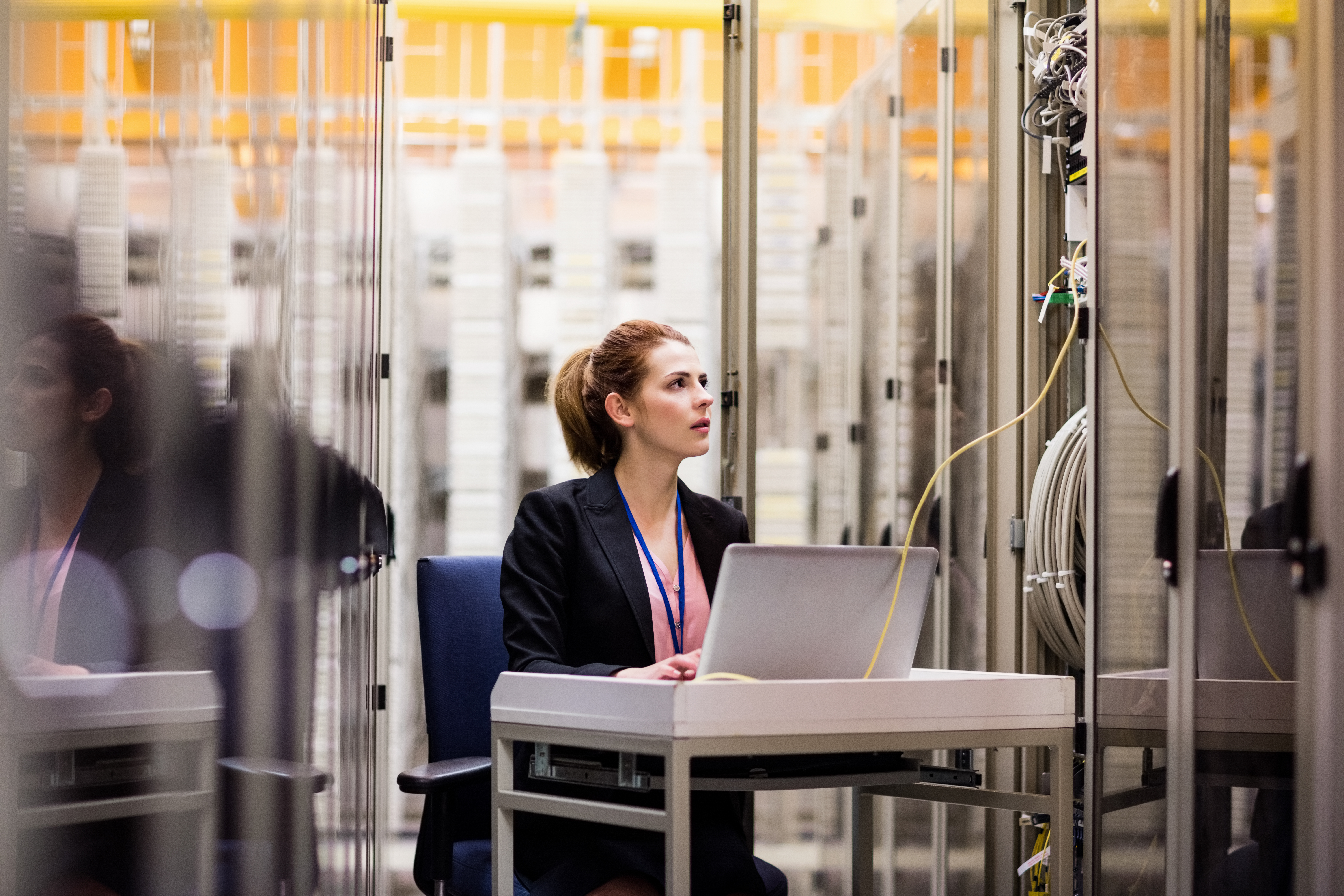 Woman working in server room