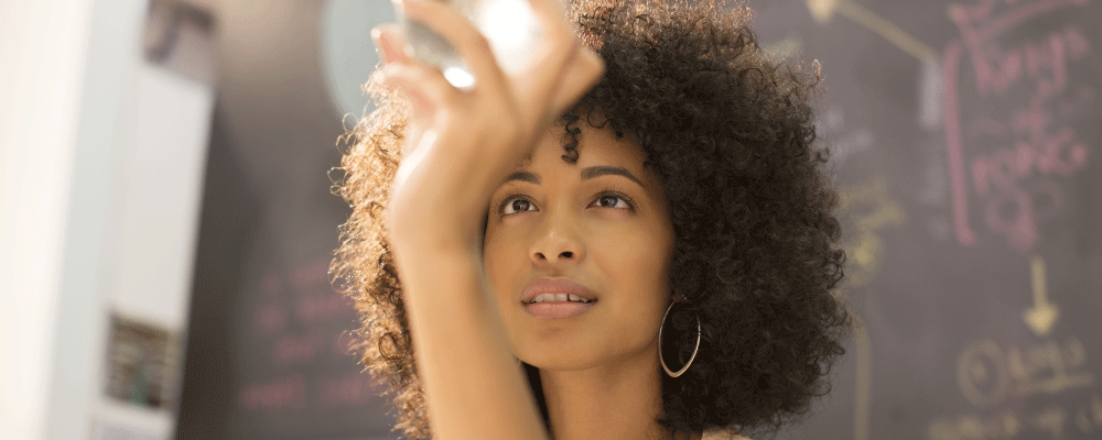 woman gazing at marble