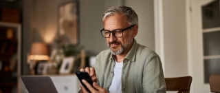 working at home phone laptop