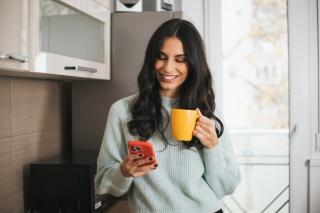 people woman orange phone yellow coffee