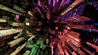 Aerial view of buildings with rainbow gradient overlay