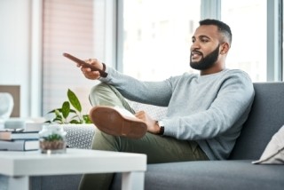 man watching tv