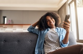 people woman couch remote