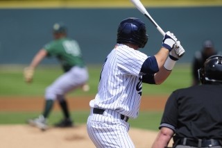 baseball player waiting to hit a pitch