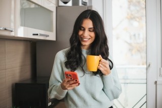 people woman orange phone yellow coffee