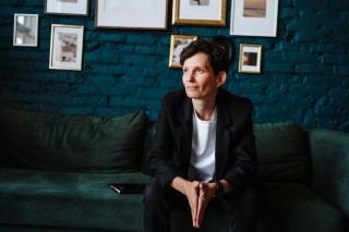 business person sitting on couch