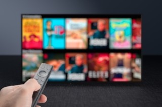 Hand remote streaming digital content on TV