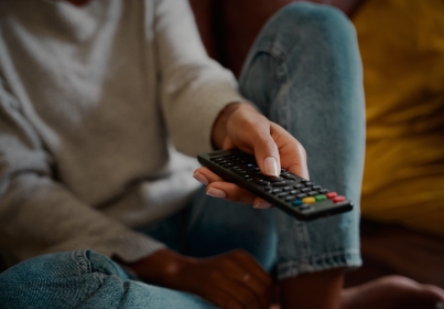 technology woman hand remote