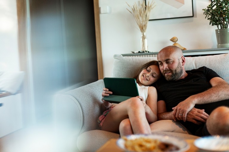 people man kid couch tablet
