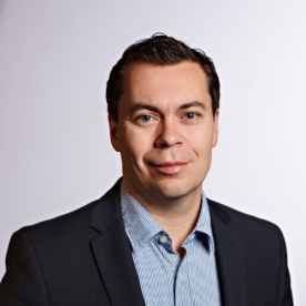 headshot of man smiling