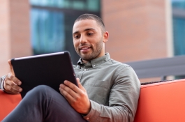 man watching tablet