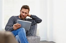 man watching tablet