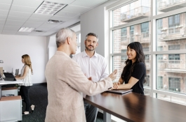 Three people having a business meeting