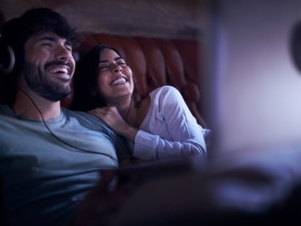 Couple watching screen