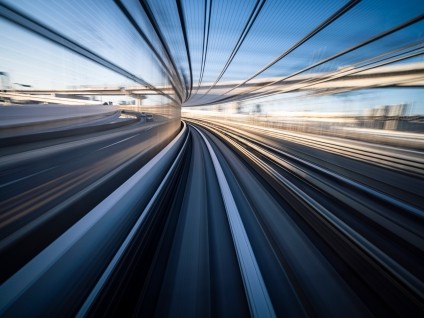 Abstract image of a train moving through a tunnnel fast
