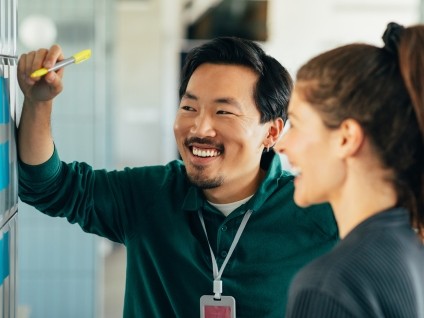 business man whiteboard smile