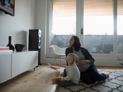 people mother child watching TV