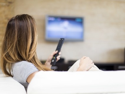 people woman watching tv