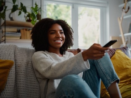 people woman couch remote