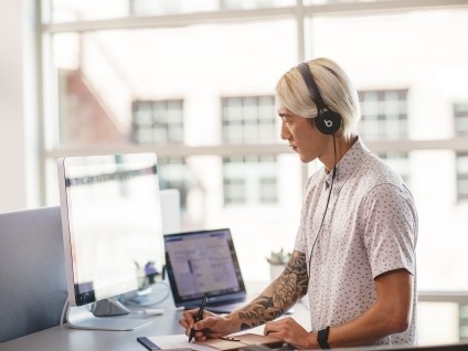 business man working with headphones